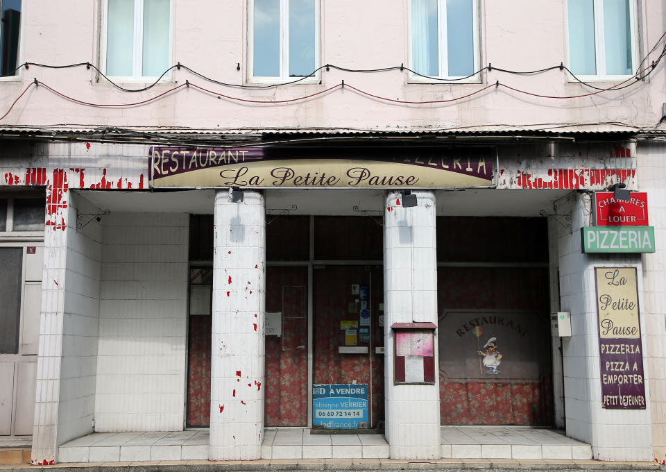 HOLD FOR STORY SLUGGED FRANCE DEATH OF THE BISTROT BY JOHN LEICESTER - This photo taken Wednesday, Sept.18,, 2019 shows a closed bar-restaurant in Peyrorade southwestern France. A mass die-off of France's bars, from 200,000 in 1960 to 36,000 now, fed into the sense of isolation and abandonment that was a driving force behind the so-called "yellow vest" protest movement that rocked France this year. (AP Photo/Bob Edme)