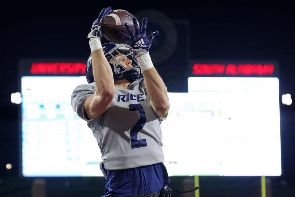 Bradley Rozner #2 of the Rice Owls catches the ball for a touchdown during the second half of the LendingTree Bowl against the Southern Miss Golden Eagles at Hancock Whitney Stadium on December 17, 2022 in Mobile, Alabama.