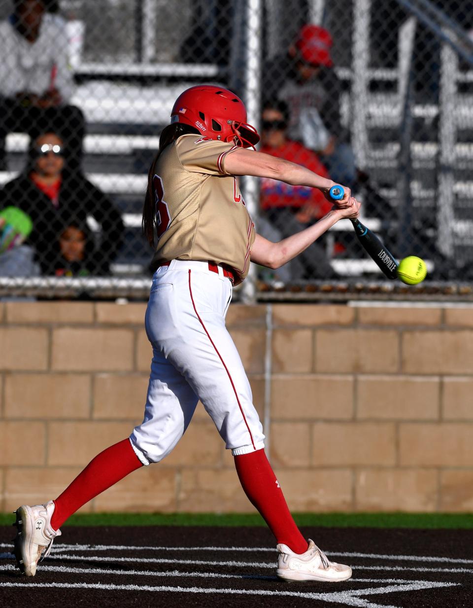 Lubbock Coronado’s Addison Andrews connects during Tuesday’s softball game against Cooper.