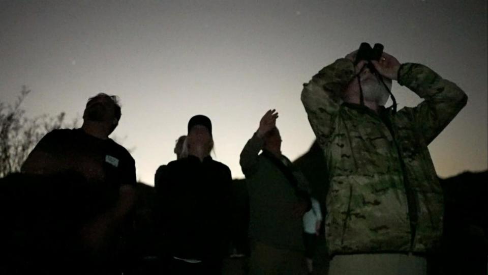 PHOTO: Members of the Arizona MUFON gaze into the night sky for any signs of unusual activity. (ABC News)