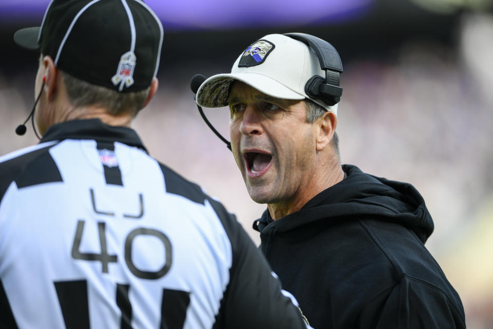 Baltimore Ravens head coach John Harbaugh yells at line judge Brian Bolinger (40) during the first half on an NFL football game against the Cleveland Browns Sunday, Nov. 12, 2023, in Baltimore. (AP Photo/Nick Wass)