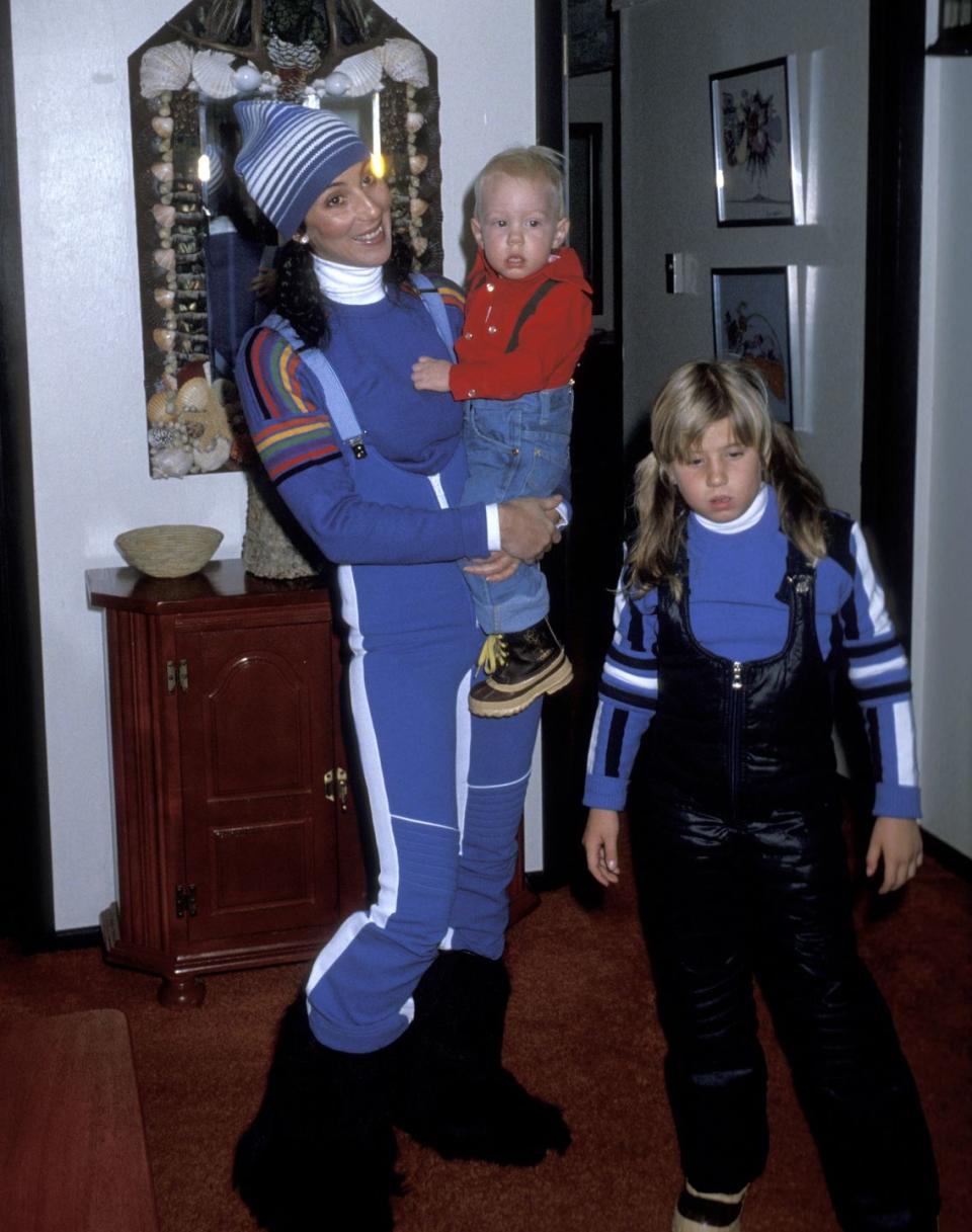 <p>Cher gets ready to hit the slopes of Aspen, Colorado with her children Chastity Bono and Elijah Blue Allman in 1977. </p>