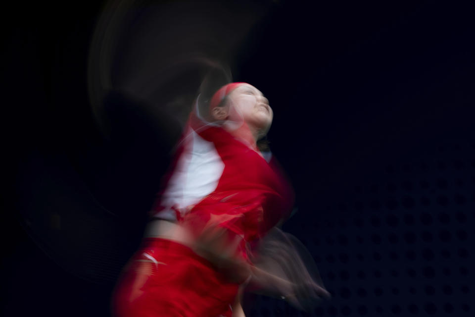 China's Chen Qingchen react during the women's team gold medal team match at the 19th Asian Games in Hangzhou, China, Sunday, Oct. 1, 2023. (AP Photo/Louise Delmotte)