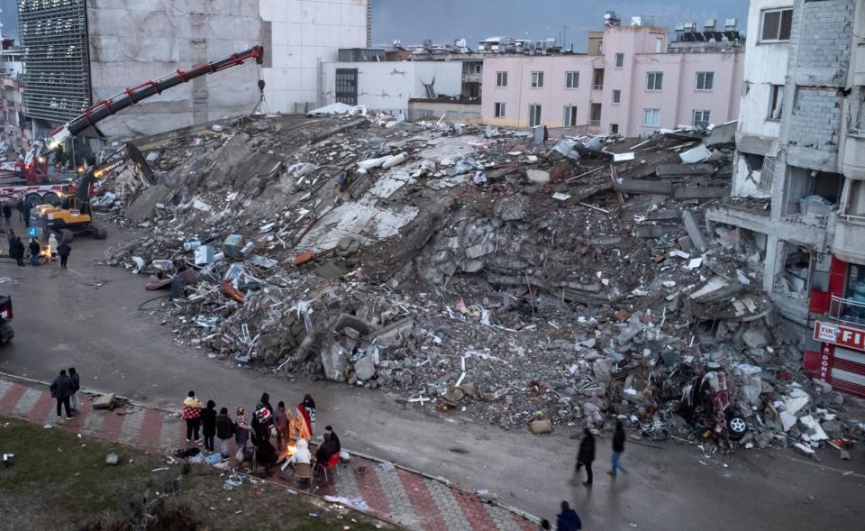 After: An aerial photo taken by a drone shows emergency personnel during a search and rescue operation at the site of a collapsed building after an earthquake in Iskenderun, district of Hatay, Turkey (EPA)