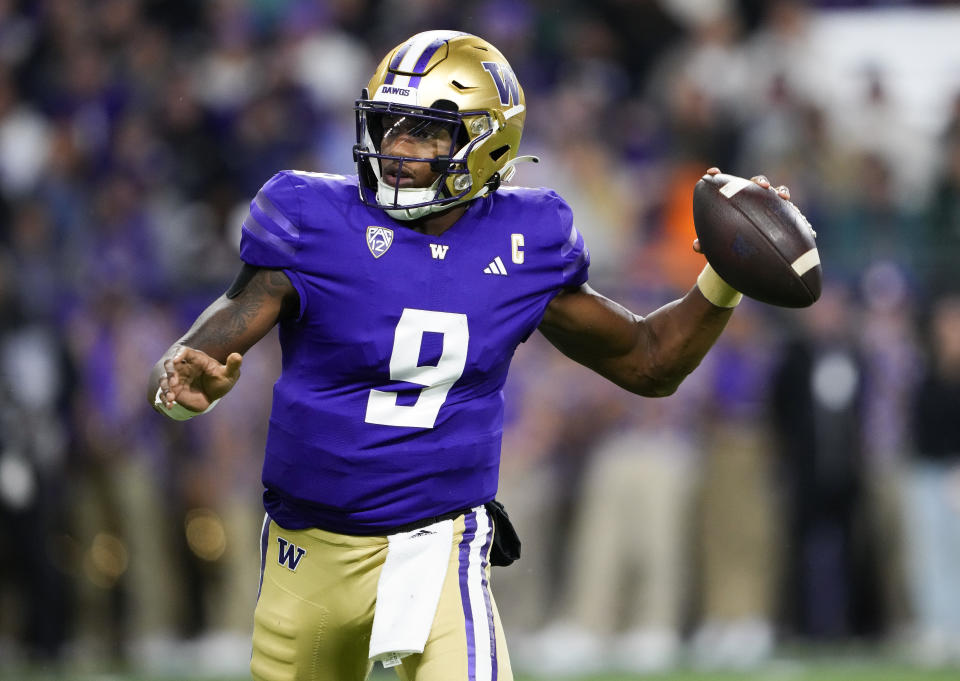 Washington quarterback Michael Penix Jr. looks for a receiver during the first half of the team's NCAA college football game against California on Saturday, Sept. 23, 2023, in Seattle. (AP Photo/Lindsey Wasson)