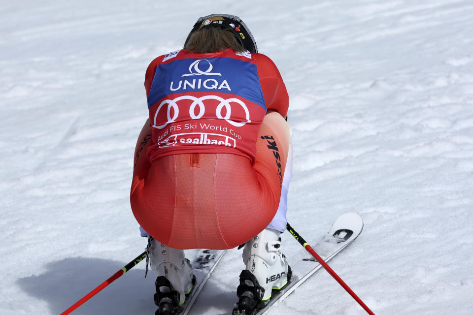 Switzerland's Lara Gut Behrami reacts after securing the giant slalom discipline at the finish area of an alpine ski, women's World Cup giant slalom race, in Saalbach, Austria, Sunday, March 17, 2024. (AP Photo/Marco Trovati)