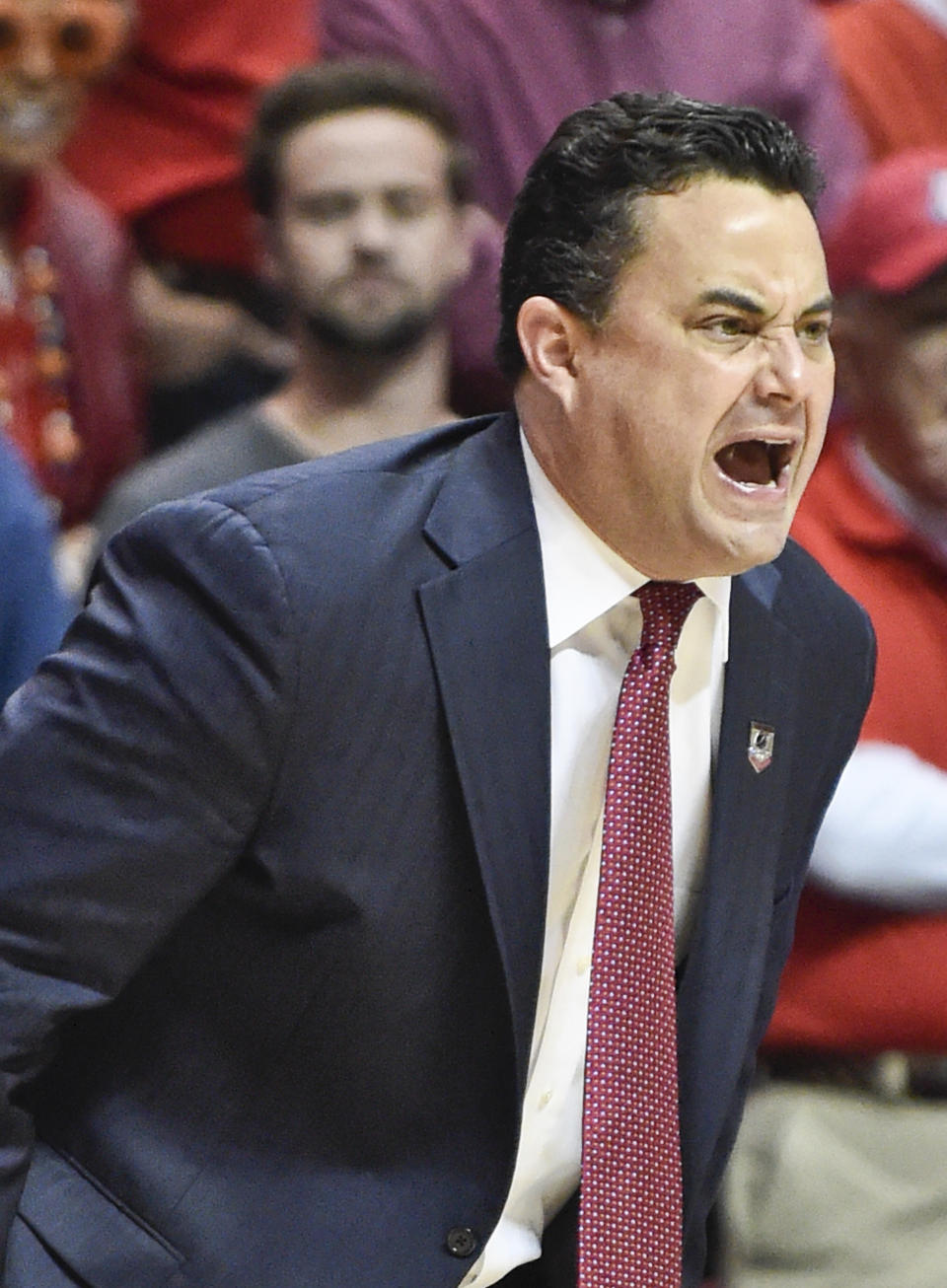 Arizona coach Sean Miller shouts during the first half of a second-round game in the NCAA college basketball tournament against Weber State Friday, March 21, 2014, in San Diego. (AP Photo/Denis Poroy)