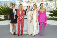 Lea Seydoux, from left, Kristen Stewart, Nadia Litz, Denise Capezza, and Lihi Kornowski pose for photographers at the photo call for the film 'Crimes of the Future' at the 75th international film festival, Cannes, southern France, Tuesday, May 24, 2022. (Photo by Joel C Ryan/Invision/AP)