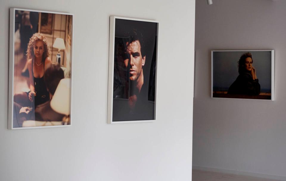 Portraits of Charlize Theron 1997, Pierce Brosnan 1985, and Glenn Close 1982, are included in the 'Nancy Ellison: Icons Unveiled' exhibition at Sotheby's Palm Beach.