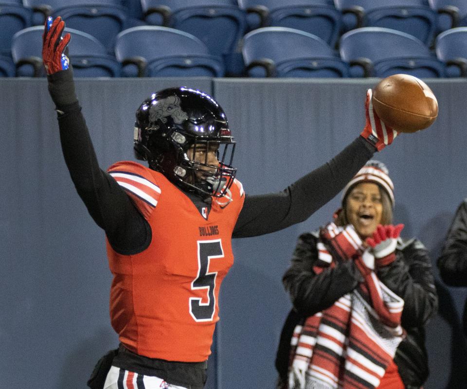 McKinley&#x002019;s Harold Fannin Jr. celebrates his reception against Jackson during the first quarter of a Division I regional quarterfinal Friday, Nov. 5, 2021.