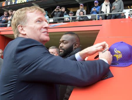 Oct 29, 2017; London, United Kingdom; NFL commissioner Roger Goodell signs autographs during an NFL International Series game between the Minnesota Vikings and the Cleveland Browns at Twickenham Stadium. Kirby Lee-USA TODAY Sports/File Photo