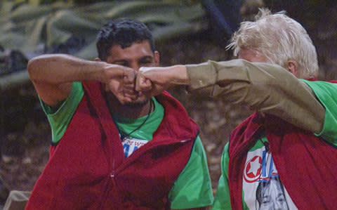 Amir Khan and Stanley Johnson fist bump 'I'm a Celebrity... Get Me Out of Here!' TV Show - Credit: REX/ITV/REX/Shutterstock