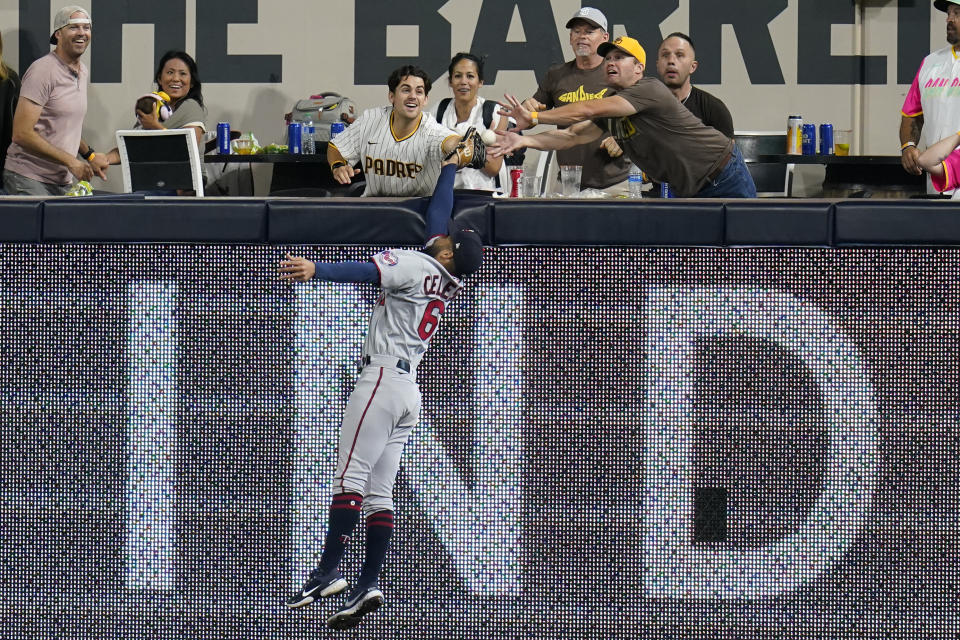 Minnesota Twins right fielder Gilberto Celestino can't reach a three-run home run hit by San Diego Padres' Jorge Alfaro during the fifth inning of a baseball game Friday, July 29, 2022, in San Diego. (AP Photo/Gregory Bull)