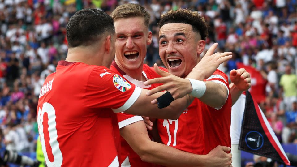 Vargas celebrates with his teammates after making it 2-0. - Ronny Hartmann/AFP/Getty Images