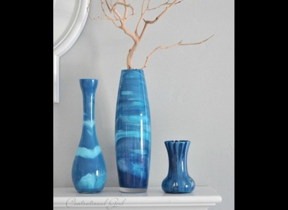 Give the gift of funky home decor with these <a href="http://www.huffingtonpost.com/2012/05/03/craft-of-the-day-paint-swirl-vase_n_1466328.html?1350327220">swirled vases</a>.