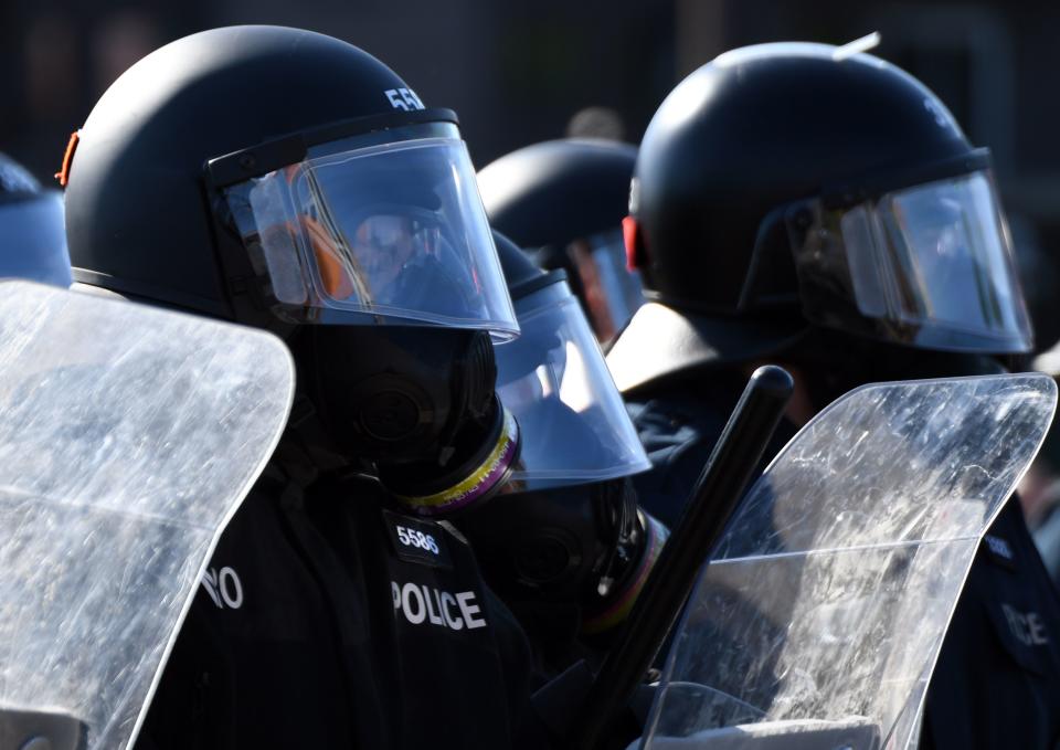 <p>Anti-riot police take positions as protesters march in Quebec City on June 8, 2018, as the G7 Summits gets underway. (Photo: Martin Ouellet-Diotte/AFP/Getty Images) </p>