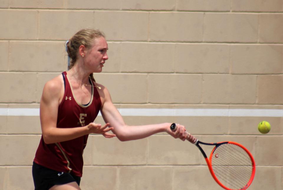 Episcopal's Ella-Jane Eddy hits the ball during a girls doubles match in April.