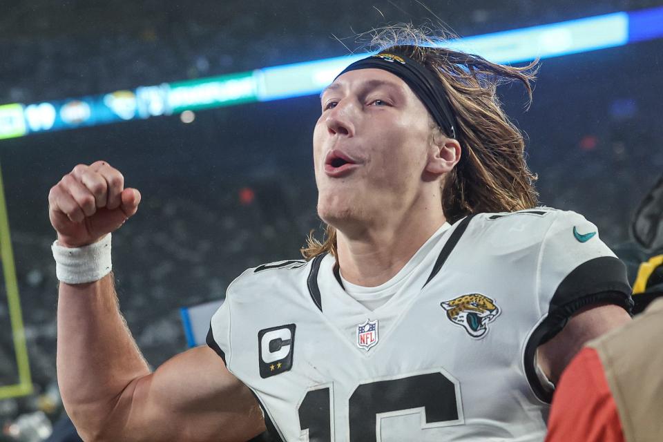 Jacksonville Jaguars quarterback Trevor Lawrence celebrates after the win against the New York Jets.