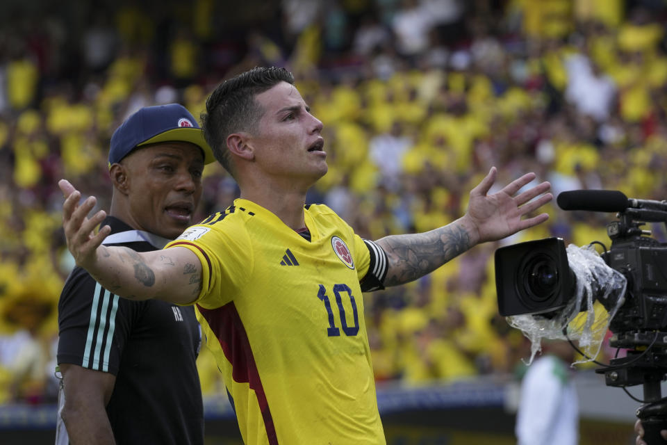 Colombia's James Rodriguez celebrates scoring the opening goal during a qualifying soccer match for the FIFA World Cup 2026 between Colombia and Uruguay at the Metropolitano stadium in Barranquilla, Colombia, Thursday, Oct. 12, 2023. (AP Photo/Fernando Vergara)
