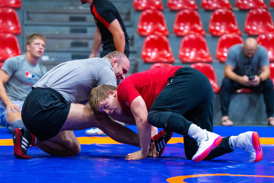 Camden McDanel, right, trains with USA coach Tervel Dlagnev during the U20 World Freestyle Championships, which were held in Amman, Jordan. McDanel went 3-1 to earn the bronze medal at 97 kilograms (approximately 214 pounds).