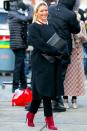 <p>Hilary Duff is all dressed up, hiding her baby bump with a large clutch on the set of <em>Younger</em> in New York City on Wednesday.</p>