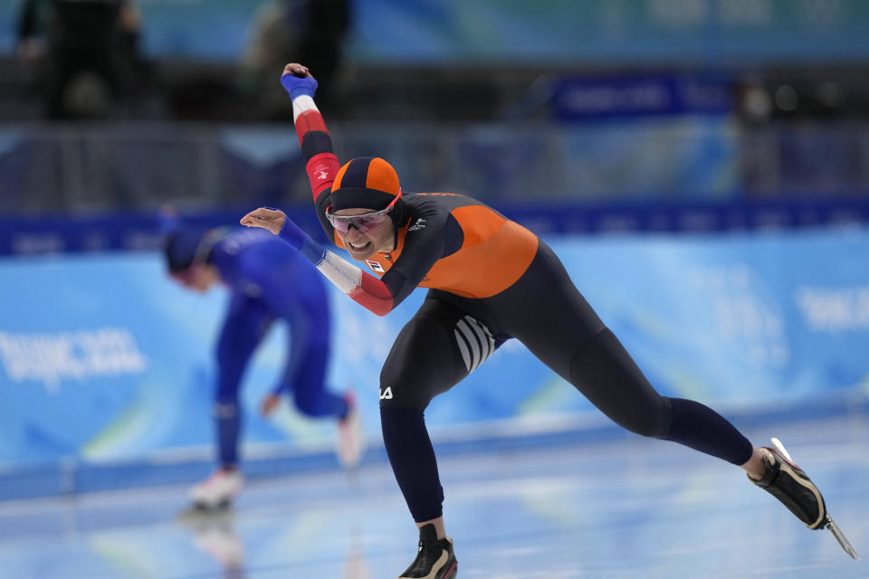 Irene Schouten of the Netherlands competes against Francesca Lollobrigida of Italy in the women's speedskating 3,000-meter race at the 2022 Winter Olympics, Saturday, Feb. 5, 2022, in Beijing. Schouten won the gold medal and set an Olympic record. (AP Photo/Sue Ogrocki)