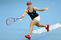 FILE - In this Jan. 9, 2020, file photo, Ashleigh Barty, of Australia, plays a shot during her match against Jennifer Brady, of the United States, at the Brisbane International tennis tournament in Brisbane, Australia. Barty will be competing in the Australian Open tennis tournament, beginning Monday, Jan. 20, 2020. (AP Photo/Tertius Pickard, File)