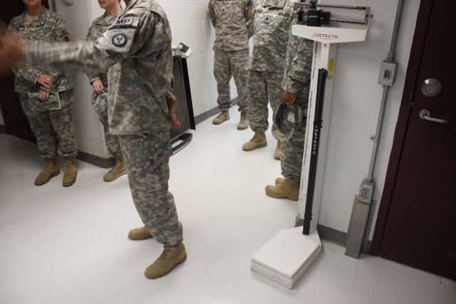 Military officials show journalists the room where some detainees were being force fed during the ongoing hunger strike at the facility.