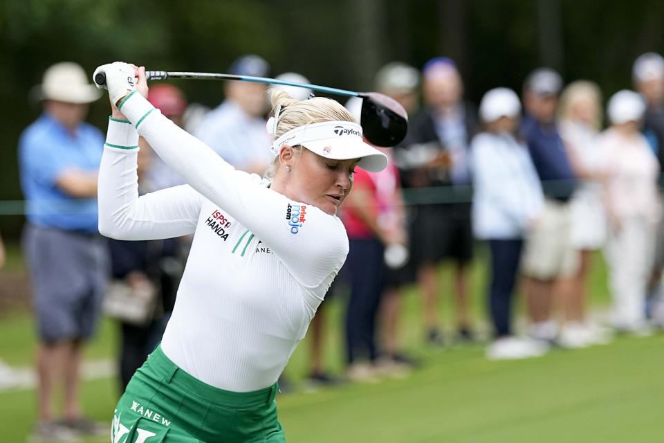 Charley Hull, of England, hits her tee shot on the 13th hole during the Chevron Championship women's golf tournament at The Club at Carlton Woods on Thursday, April 20, 2023, in The Woodlands, Texas. (AP Photo/David J. Phillip)