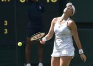 Britain Tennis - Wimbledon - All England Lawn Tennis & Croquet Club, Wimbledon, England - 5/7/16 Russia's Anastasia Pavlyuchenkova reacts during her match against USA's Serena Williams REUTERS/Toby Melville