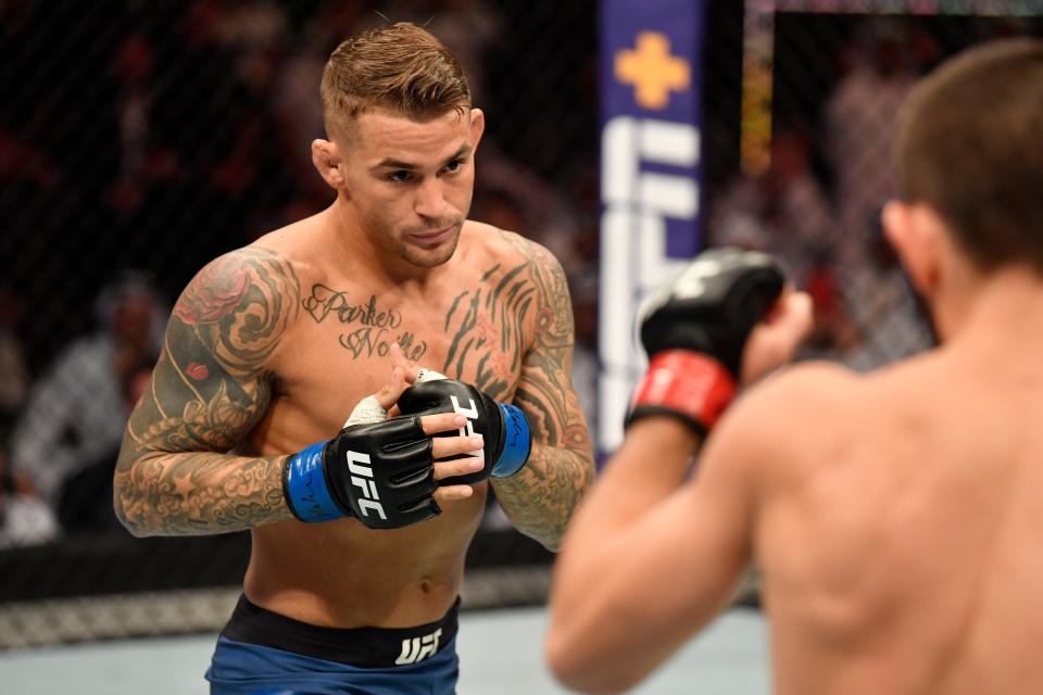 ABU DHABI, UNITED ARAB EMIRATES - SEPTEMBER 07:  (L-R) Dustin Poirier battles Khabib Nurmagomedov of Russia in their lightweight championship bout during UFC 242 at The Arena on September 7, 2019 in Yas Island, Abu Dhabi, United Arab Emirates. (Photo by Jeff Bottari/Zuffa LLC/Zuffa LLC via Getty Images)