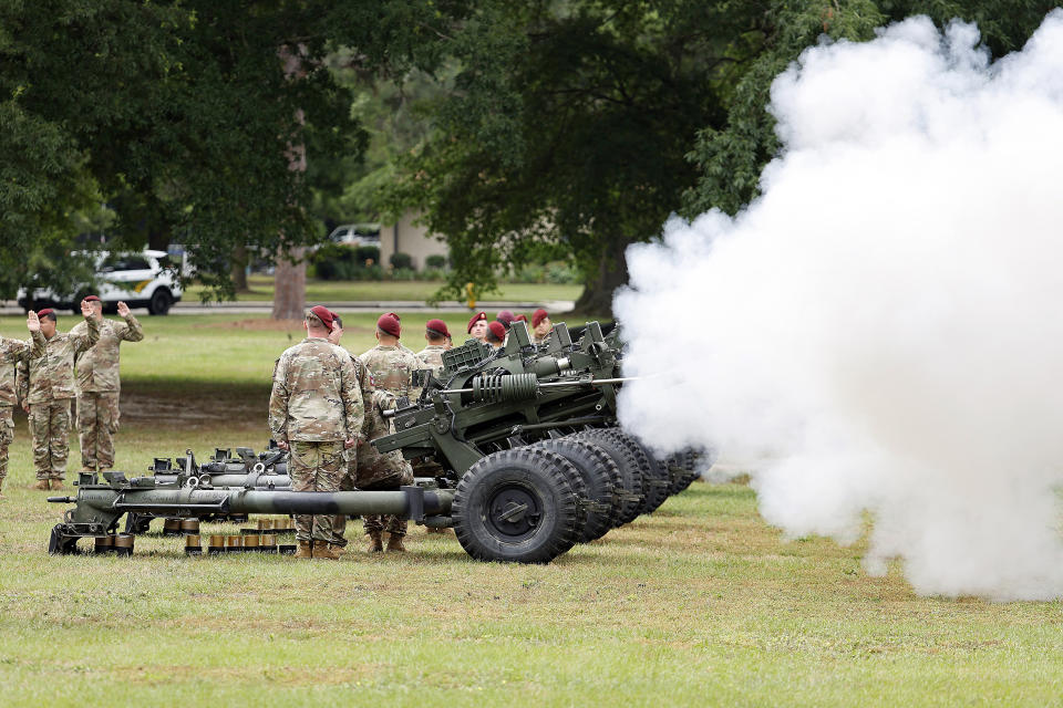 Crews fire their guns during a 15-gun salute as a part of the ceremony to rename Fort Bragg, Friday, June 2, 2023 in Fort Liberty, N.C. The U.S. Army changed Fort Bragg to Fort Liberty as part of a broader initiative to remove Confederate names from bases. (AP Photo/Karl B DeBlaker)