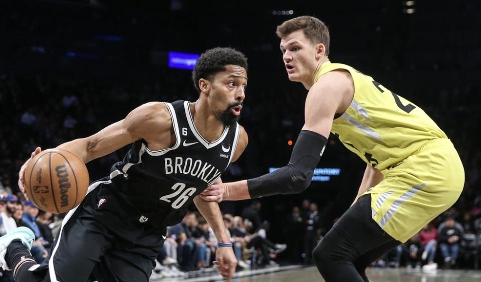 Brooklyn Nets guard Spencer Dinwiddie (26) looks to drive past Utah Jazz center Walker Kessler (24) in the first quarter at Barclays Center.