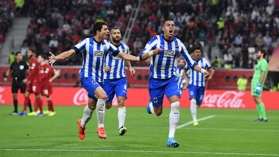 DOHA, QATAR - DECEMBER 18: Rogelio Funes of C.F. Monterrey celebrates with teammate Stefan Medina of C.F. Monterrey after scoring their team's first goal during the FIFA Club World Cup semi-final match between Monterrey and Liverpool FC at Khalifa International Stadium on December 18, 2019 in Doha, Qatar. (Photo by David Ramos - FIFA/FIFA via Getty Images)