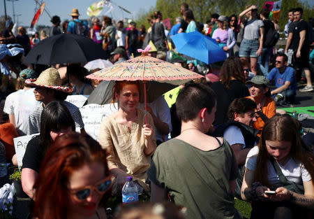 Climate change activists attend the Extinction Rebellion protest in London, Britain April 21, 2019. REUTERS/Hannah McKay