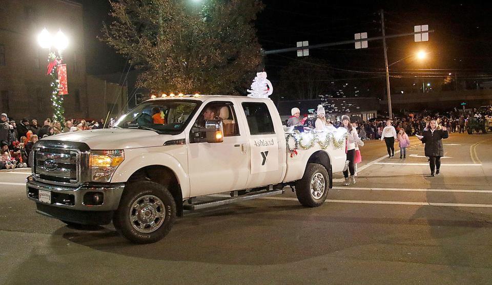 The Ashland YMCA's entry in Ashland's 2021 Christmas parade is seen heading down Claremont Avenue at West Main Street on Saturday, Dec. 4, 2021. TOM E. PUSKAR/TIMES-GAZETTE.COM