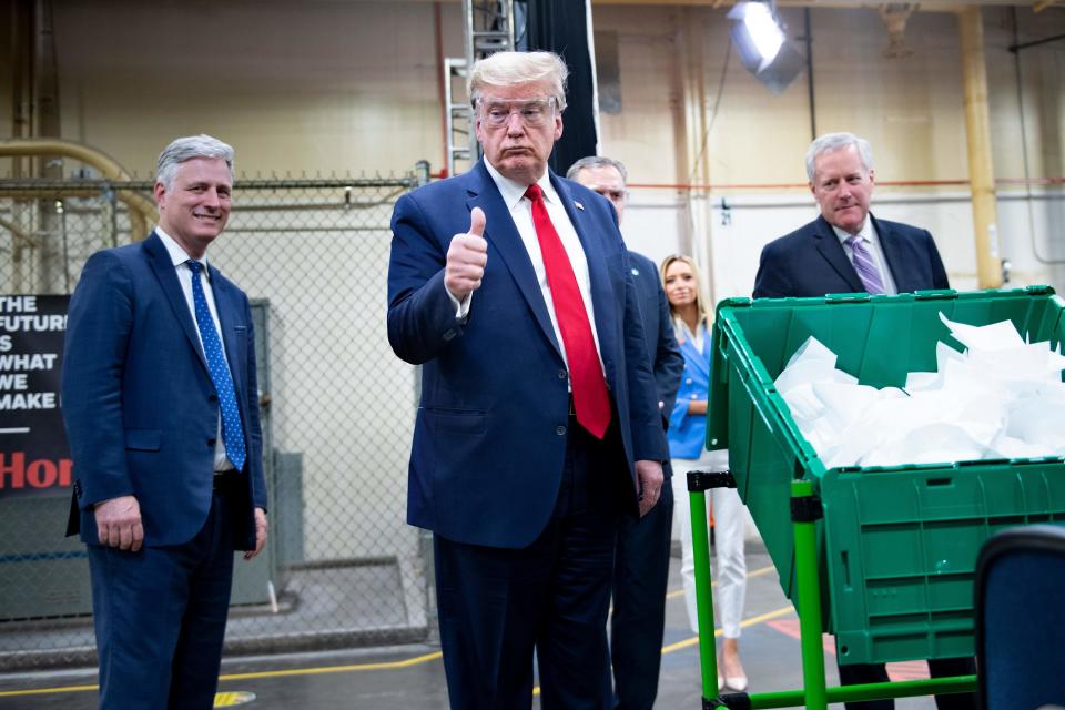 President Donald Trump tours a Honeywell plant that produces N95 masks.