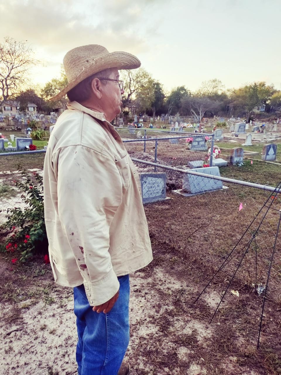 Former schoolteacher and principal Humberto De Los Santos surveys work at the Benavides Cemetery on Monday, Nov. 7, 2022, in preparation for a Veterans Day celebration.
