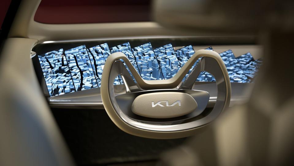 <p>The center console stretches back toward the rear seats and appears to float, an effect that is echoed by the mounts for the front seats. Refreshingly for a concept car in 2019, Kia makes no mention of an autonomous mode that sees the steering wheel fold away, although the pedals do disappear when the car is turned off.</p>