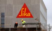 The company's logo of Swiss chemicals group Sika is seen on an office building in Zurich, Switzerland, December 8, 2014. REUTERS/Arnd Wiegmann/File Photo