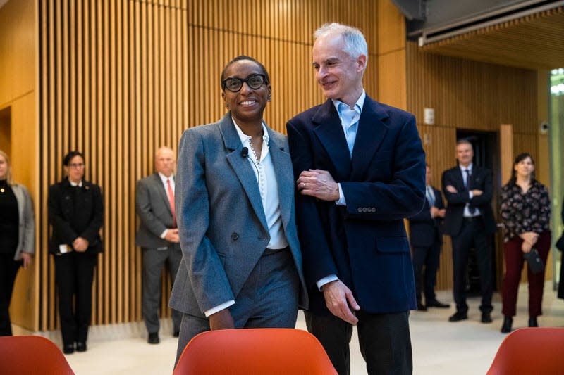 Cambridge, MA - December 15: Claudine Gay embraces her husband, Chris Adendulis. Harvard University on Thursday named Gay as its next president in a historic move that will give the nations oldest college its first Black leader.