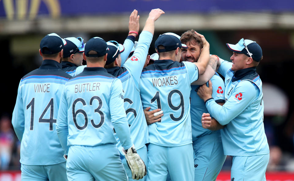 England's Liam Plunkett (second right) celebrates taking the wicket of New Zealand's Kane Williamson, caught by Jos Buttler (63), during the ICC World Cup Final at Lord's, London.