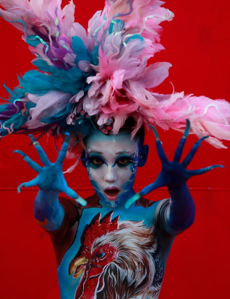 A model participates in a 2012 International Bodypainting Festival Asia at Duryu park on September 1, 2012 in Daegu, South Korea. The festival is the largest event in the field of body painting and spreads the art form to thousands of interested visitors each year. (Photo by Chung Sung-Jun/Getty Images)