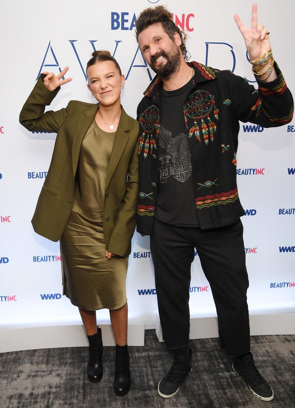 Millie Bobby Brown and Shaun Neff attend the 2019 WWD Beauty Inc Awards at The Rainbow Room in N.Y.C. on Wednesday.