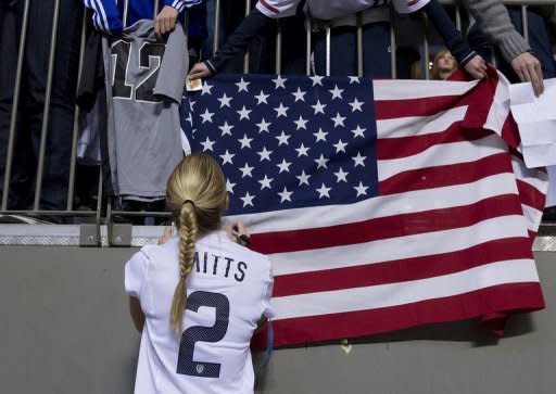 Heather Mitts of the United States signs an autograph after defeating Costa Rica 3-0 in semifinals action of the 2012 CONCACAF WomenÃâ¢s Olympic Qualifying Tournament at BC Place, on January 27, in Vancouver, British Columbia, Canada. The win qualifies the United States for the 2012 Summer Olympic Games in London