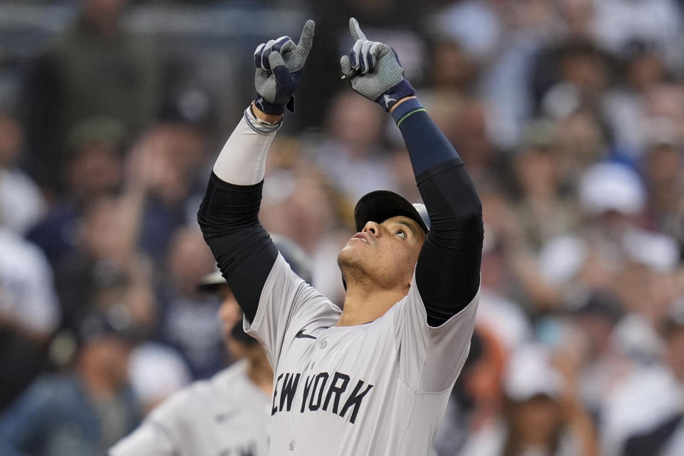 New York Yankees' Juan Soto celebrates after hitting a two-run home run during the third inning of a baseball game against the San Diego Padres, Friday, May 24, 2024, in San Diego. (AP Photo/Gregory Bull)