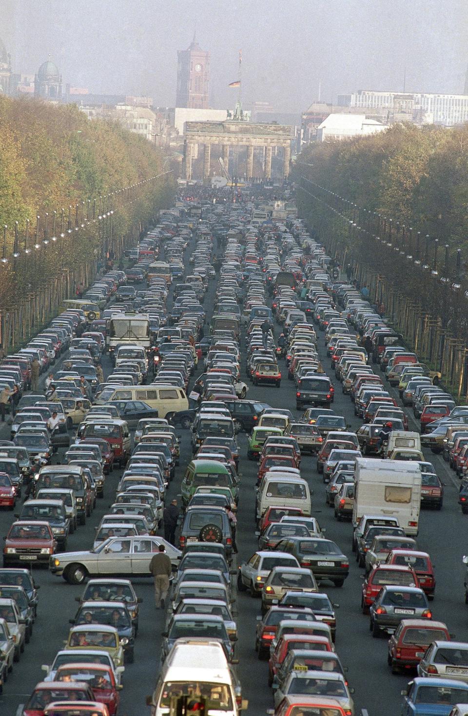 Thousands of cars queue up in front of Brandenburg Gate in West Berlin on Saturday, Nov. 11, 1989, due to few hundred thousands of East Germans swept into West Berlin with their Trahant and Wartburg cars. 