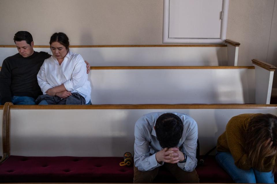 People attend a vigil at Woodmont Christian for those who were killed in a mass shooting at The Covenant School (Getty Images)