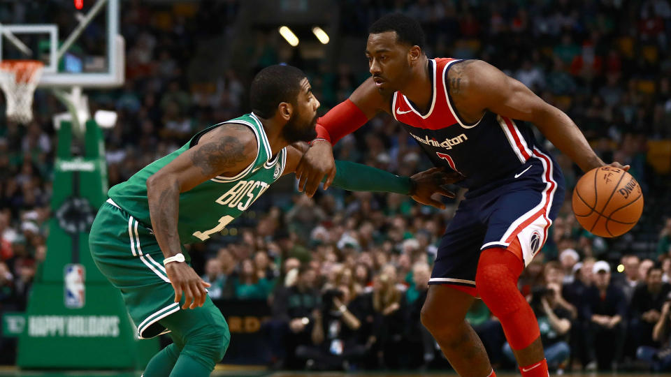 John Wall recovered from a missed dunk to help the Wizards rally past the Celtics on Christmas. (Getty)