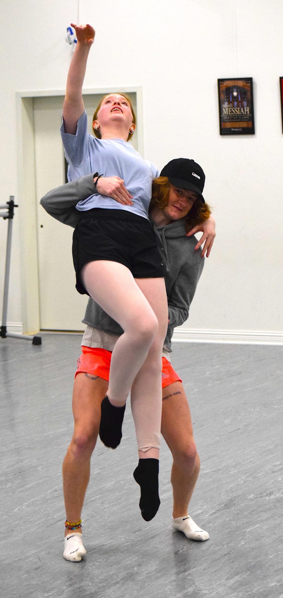 Zeke Galbraith and Ella Sommers work on their dance routine for the Artists & Athletes fundraiser for Holmes Center for the Arts. the event will be held Saturday, March 18, at Ohio Star Theater in Sugarcreek.